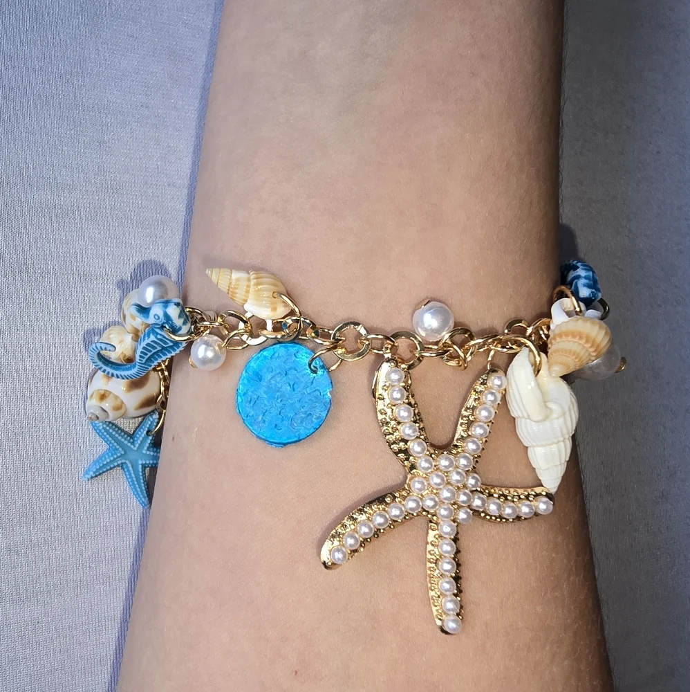 Ocean-Themed Charm Bracelet with Blue‎ and Gold Color Accents